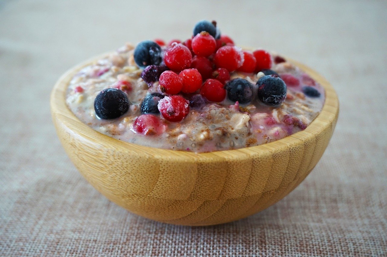 Overnight oats in a bowl with berries on top